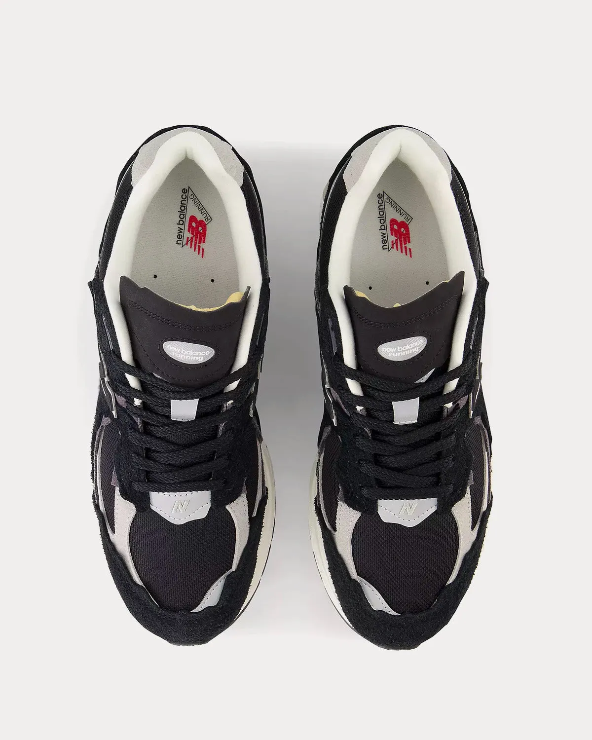 2002rd Black / Concrete / Silver Metallic Low Top Sneakers
